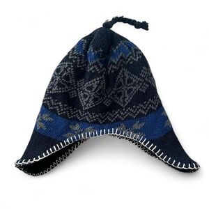 Navy blue and white patterned knit hat with ear flaps